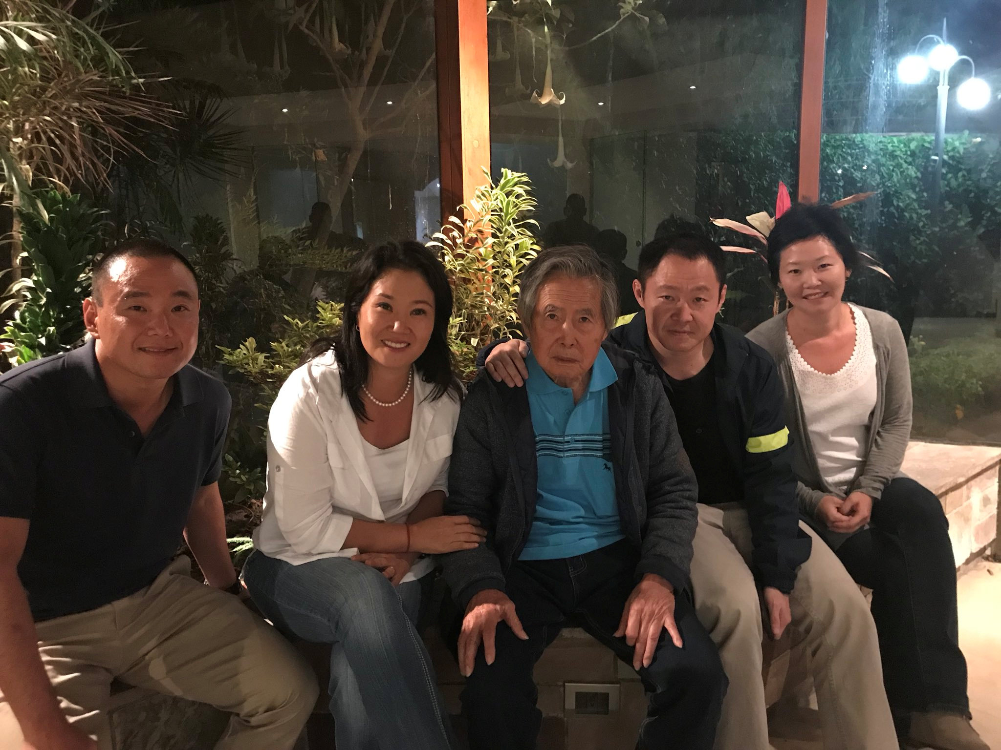 Former Peruvian President Alberto Fujimori poses for a photo with daughter Keiko and son Kenji and two unidentified family members in Lima, Peru, in this photo obtained from social media, January 4, 2018. Keiko Fujimori/via REUTERS THIS IMAGE HAS BEEN SUPPLIED BY A THIRD PARTY. MANDATORY CREDIT. NO RESALES. NO ARCHIVES